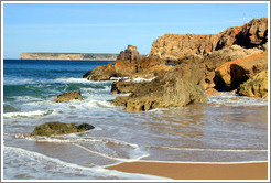 Rocks behind the sandy beach, Praia do Tonel (Tonel Beach).